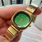 Gold Strap Green Surface
