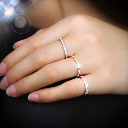 A Single-row Diamond-studded Zircon Micro-pave Open Ring