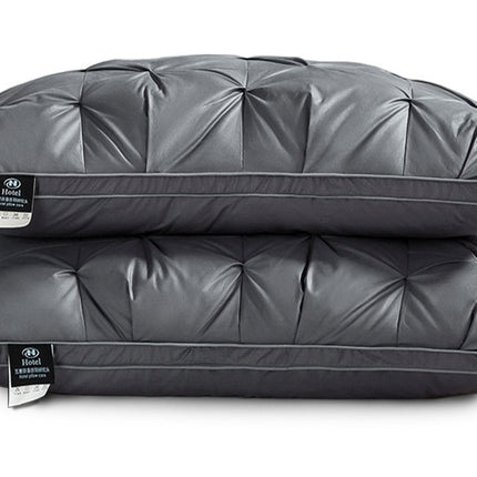 A Pair Of Feather Pillows And White Goose Single Neck Guards