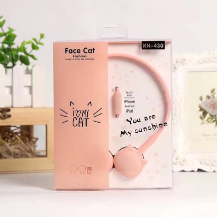 Kitten, ear, wearing headphones