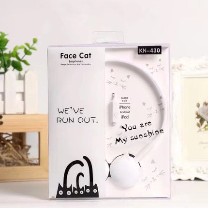 Kitten, ear, wearing headphones