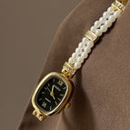 Gold Strap Black Surface