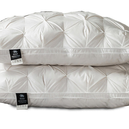 A Pair Of Feather Pillows And White Goose Single Neck Guards