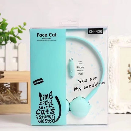 Kitten, ear, wearing headphones