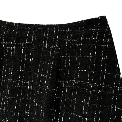 The Elegant A-Line Midi Skirt in Tweed Is Comfortable for Commuting During The Autumn And Winter Seasons.