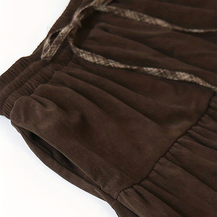 A Thick Patchwork Midi Skirt with a Pocket, Featuring a Corduroy Checkered Design And a Tie