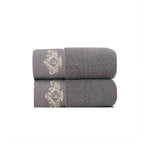 2 brown face towels