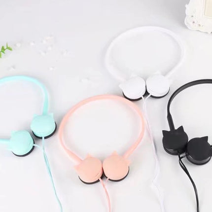 Kitten, ear, wearing headphones