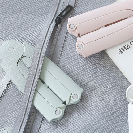 Mini travel folding hanger