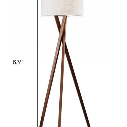 63" Brown And White Solid Wood Tripod Floor Lamp With White Linen Drum Shade