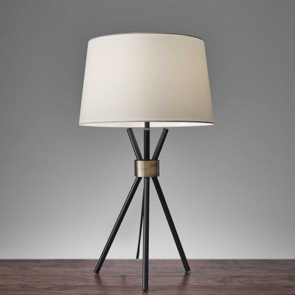 Black Metal Tripod Leg With Antique Brass Accent Table Lamp