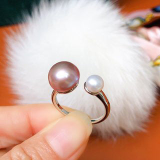 Freshwater Pearl Ring Featuring A Mix Of Large And Small Pearls In A Variety Of Colors