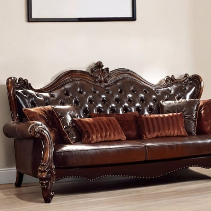 93" Brown Faux Leather Sofa And Toss Pillows With Burgundy Legs