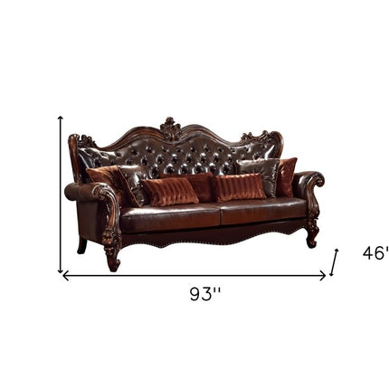 93" Brown Faux Leather Sofa And Toss Pillows With Burgundy Legs