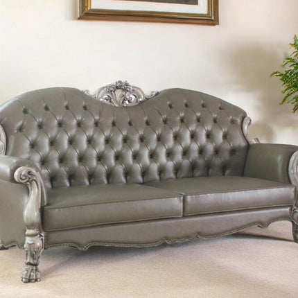 96" Bone Faux Leather Sofa And Toss Pillows With White Legs