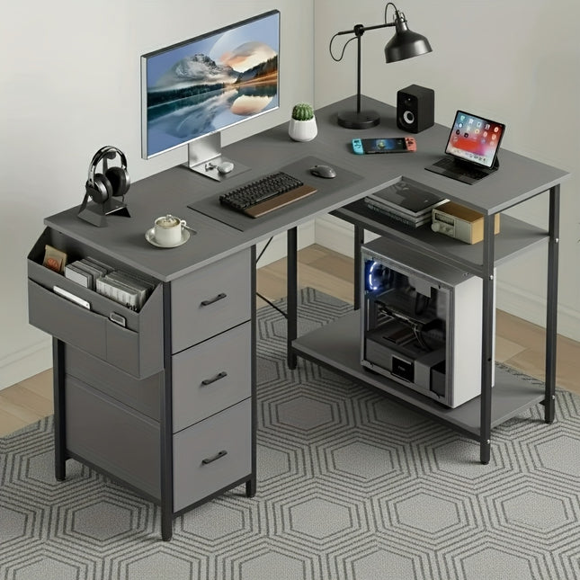L-Shaped Gaming Desk Measuring 47 by 139.7 cm, Featuring Three Fabric Drawers for Storage.