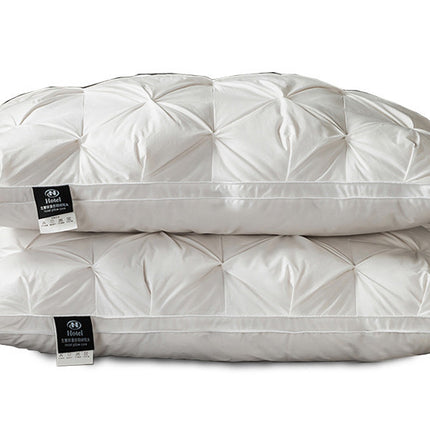 A Pair Of Feather Pillows And White Goose Single Neck Guards