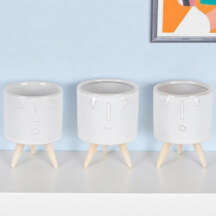 Set of Three White Porcelain 1 Ounce Round Funny Face Pot Planters With Stands