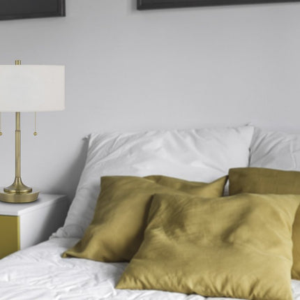 20" Antiqued Brass Metal Two Light Table Lamp With White Drum Shade