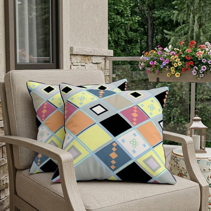 Set of Two Yellow And Pink Diamond Indoor Outdoor Throw Pillow