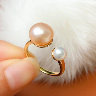 Freshwater Pearl Ring Featuring A Mix Of Large And Small Pearls In A Variety Of Colors