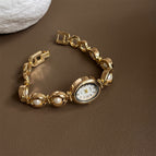 Gold Strap White Surface