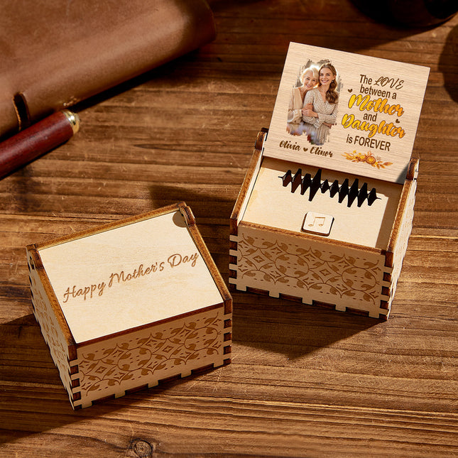 Personalized wooden music box for Mother's Day with engraved "Happy Mother's Day" and photo.
