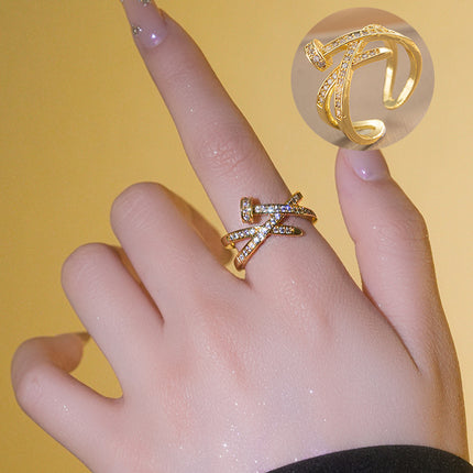 A Diamond Studded Zircon Nail Layered Open Ring