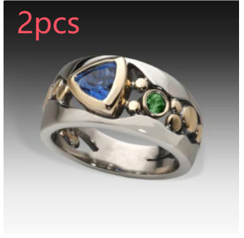 Openwork pattern inlaid green zircon ring