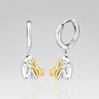 Girl and cat with gold earring