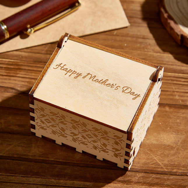 Personalized wooden music box with "Happy Mother's Day" engraving, ideal Mother's Day gift.