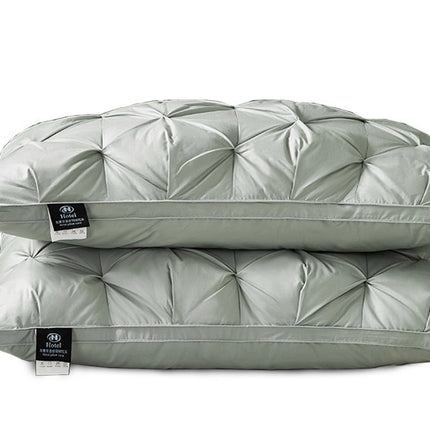 A Pair Of Feather Pillows And White Goose Single Neck Guards