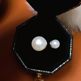 Freshwater Pearl Ring Featuring A Mix Of Large And Small Pearls In A Variety Of Colors