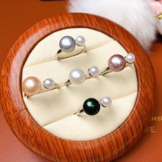Freshwater Pearl Ring Featuring A Mix Of Large And Small Pearls In A Variety Of Colors