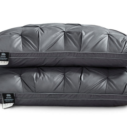 A Pair Of Feather Pillows And White Goose Single Neck Guards