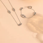 Steel-colored set (necklace + bracelet)