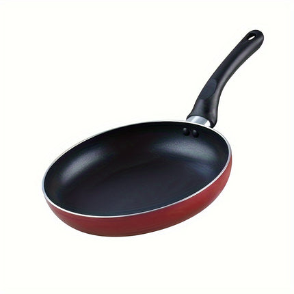 clean orange frying pans, spoons, spatulas, soup spoons, colorful pots and pans set for home 10 piece