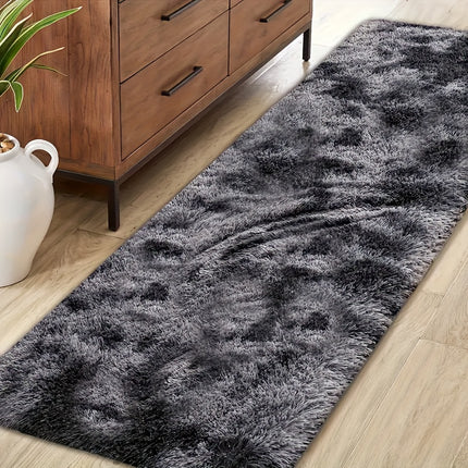 A Recommended Plush Area Rug Made of Soft Material, Featuring a Multicolored Tie-Dye Design.