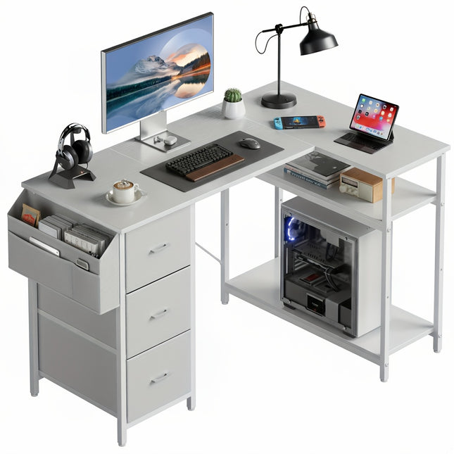 L-Shaped Gaming Desk Measuring 47 by 139.7 cm, Featuring Three Fabric Drawers for Storage.